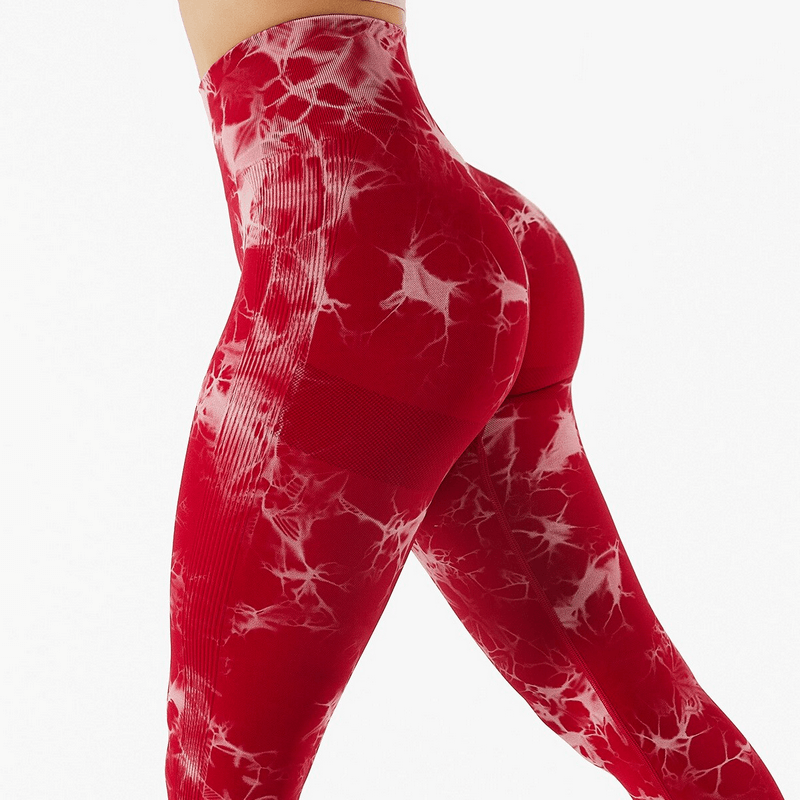 Red seamless elastic high waist women's leggings for fitness, featuring a stylish design ideal for yoga and workouts.